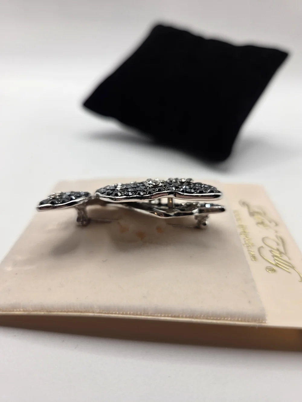 1668. Kirks Folly Black and Silver Tone Crystal Butterfly Brooch